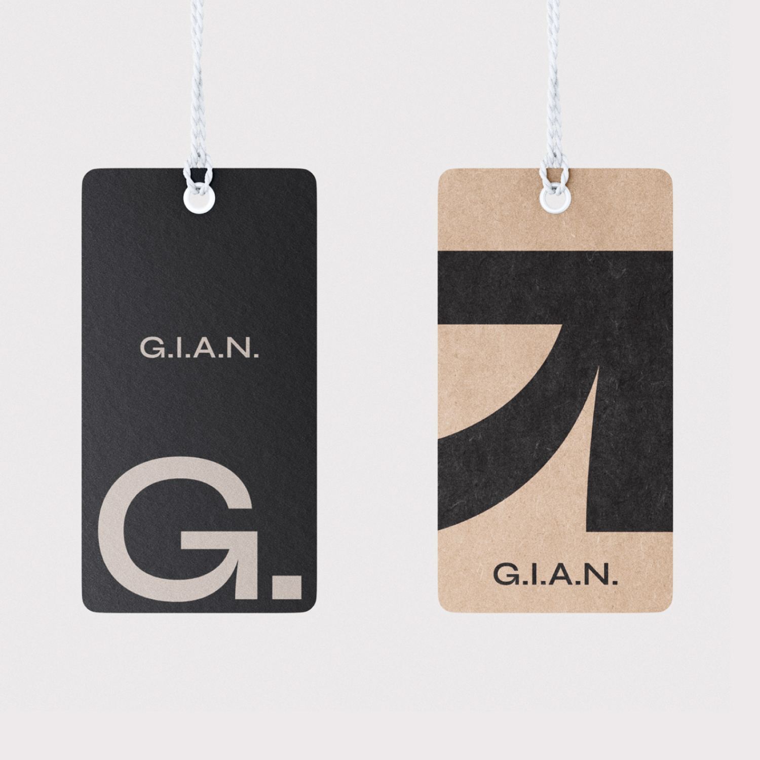 G.I.A.N. fashion brand clothing tags with monogram