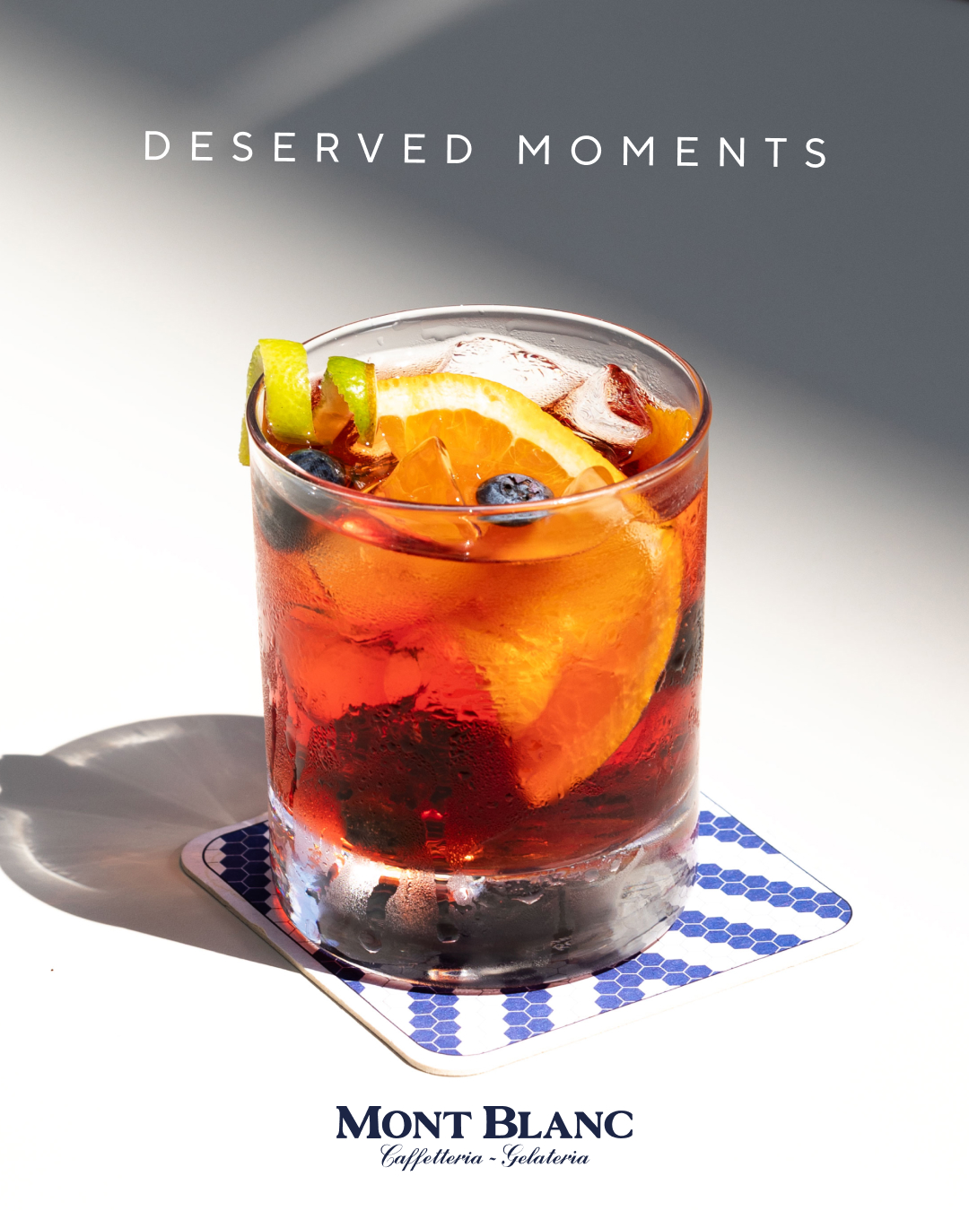 Mont Blanc Zug café and gelateria poster featuring a citrus cocktail